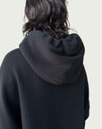 Rear view of double layered hood on Organic Contoured Cotton A.D.C. Hoodie in Black.