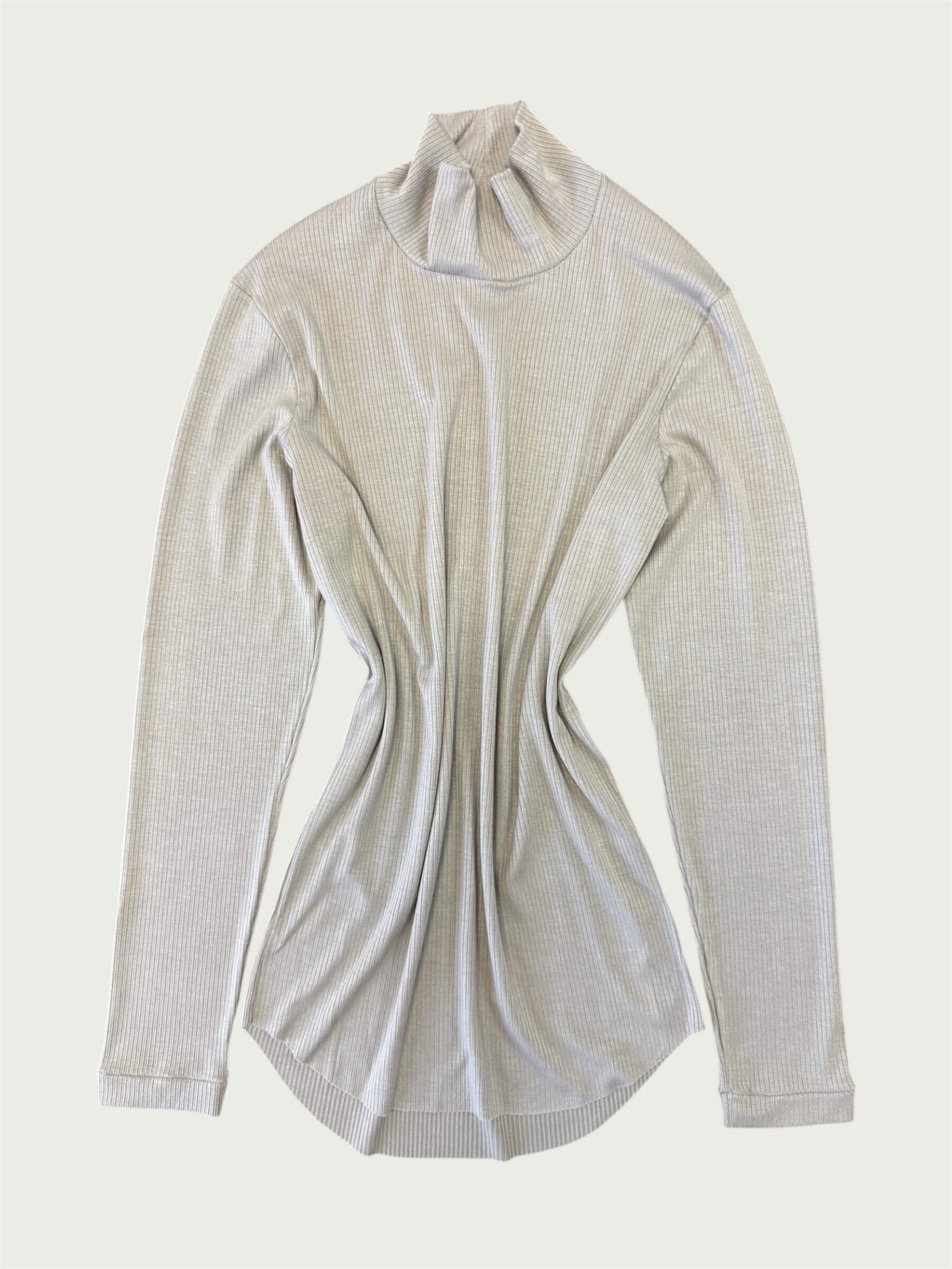 Flat lay of Ribbed Mock Neck Shirttail Top in Dove Grey, featuring its rounded shirttail hem.