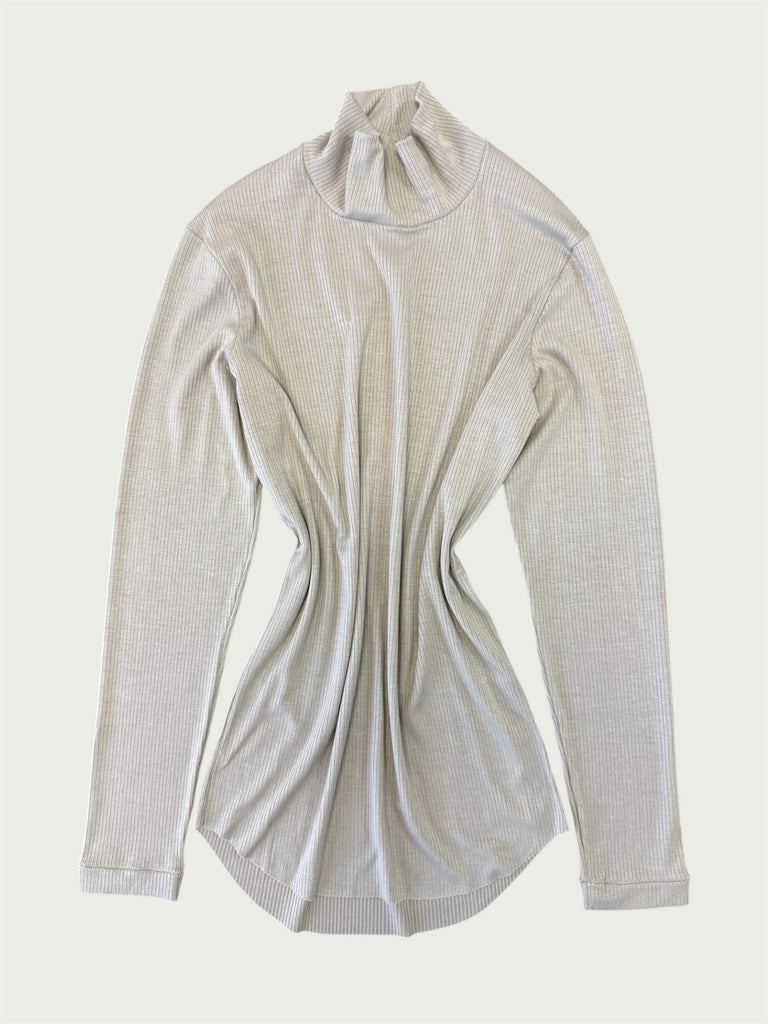 Flat lay of Ribbed Mock Neck Shirttail Top in Dove Grey, featuring its rounded shirttail hem.