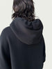 Rear view of double layered hood on Organic Contoured Cotton A.D.C. Hoodie in Black.